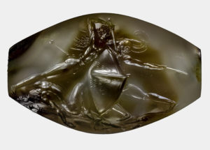 An Ancient Greek Artwork Was Graved On A Small Gemstone