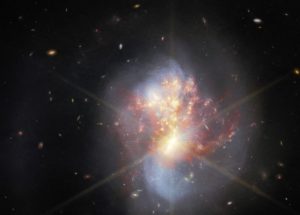 James Webb Spots Collision Between Galaxies That Gives Birth to Numerous Stars